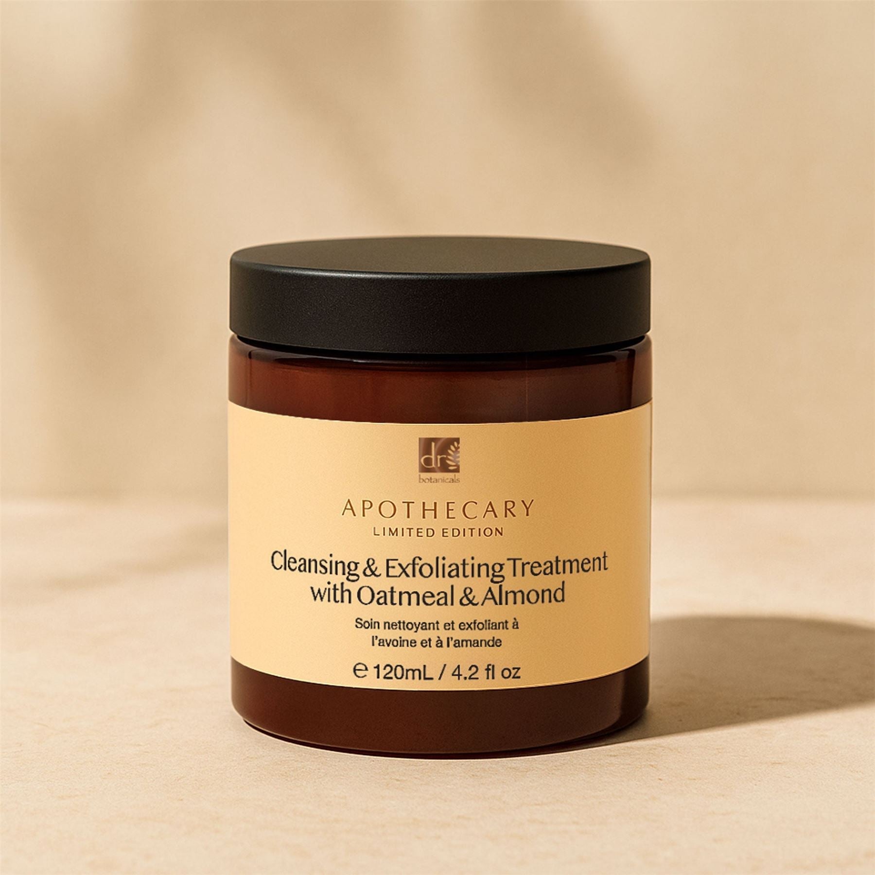 Jar of Apothecary Skin Treat Natural Exfoliating Body Scrub on a beige background