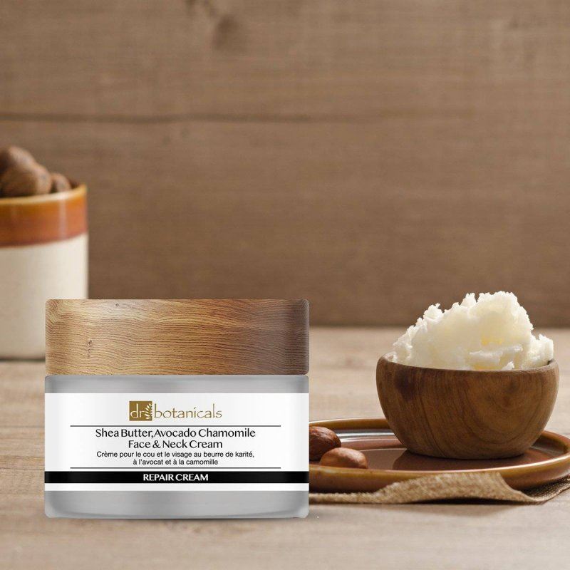 Shea Butter Avocado Chamomile Face & Neck Cream with wooden container on a wooden surface
