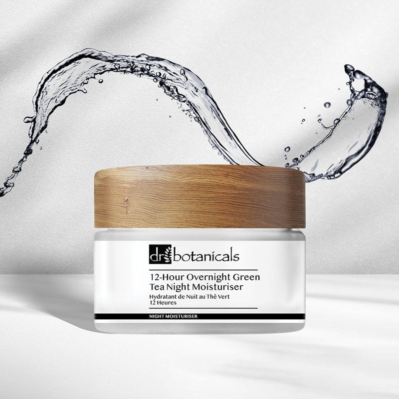 Skincare jar with wooden lid and water splash on a white background