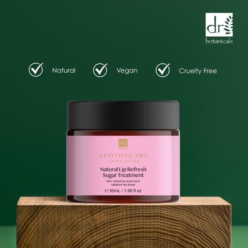 Jar of Apothecary Natural Lip Refresh Sugar Treatment on a wooden block with green background and Dr Botanicals logo.