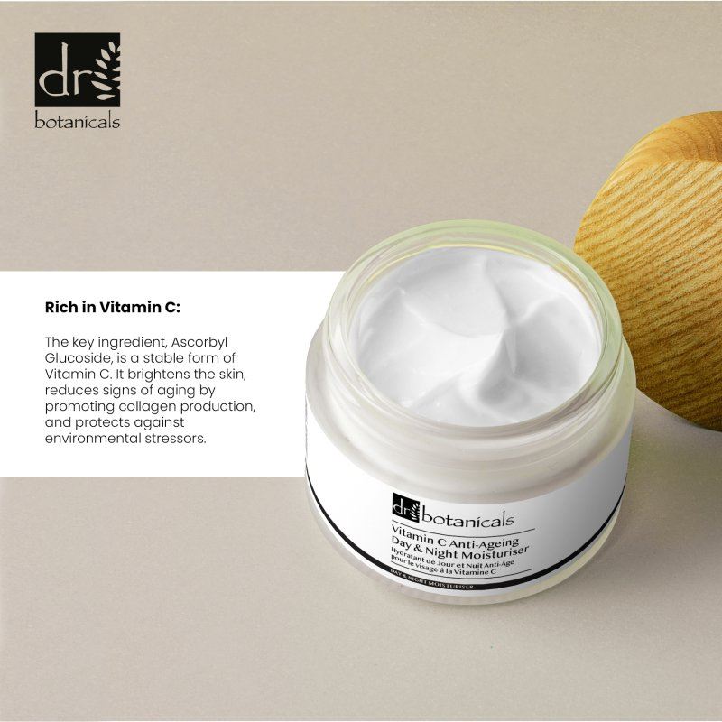 Jar of skincare cream with text about Vitamin C and Dr Botanicals branding.