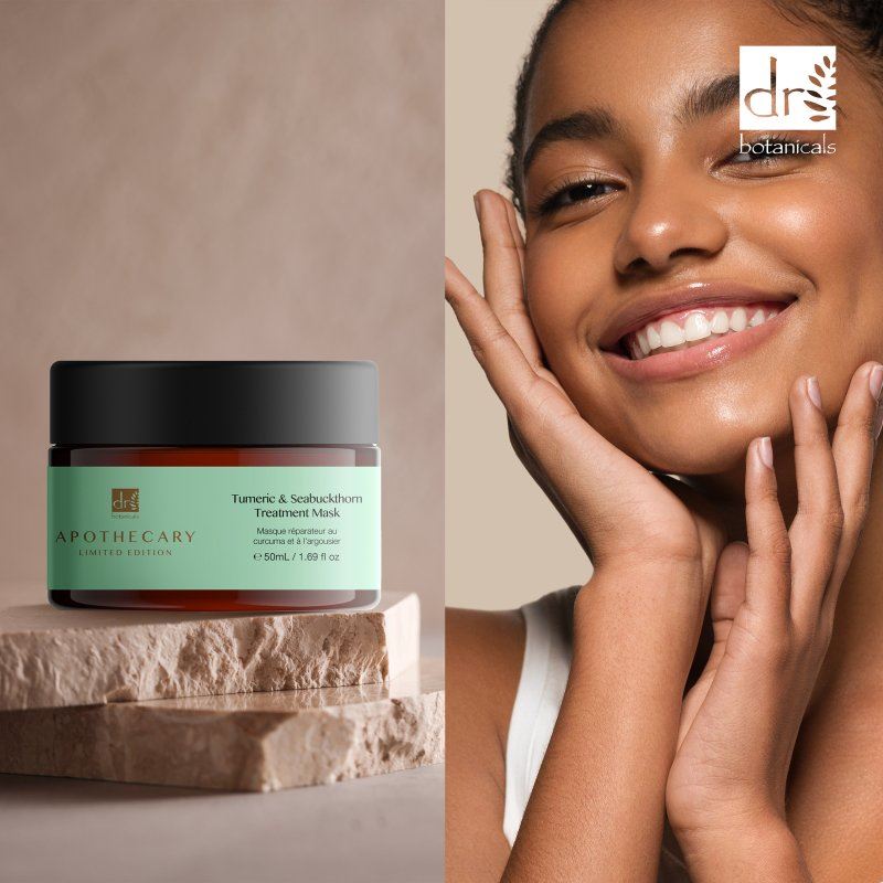 Jar of Apothecary treatment mask on a stone surface with a woman touching her face, featuring Dr Botanicals branding.