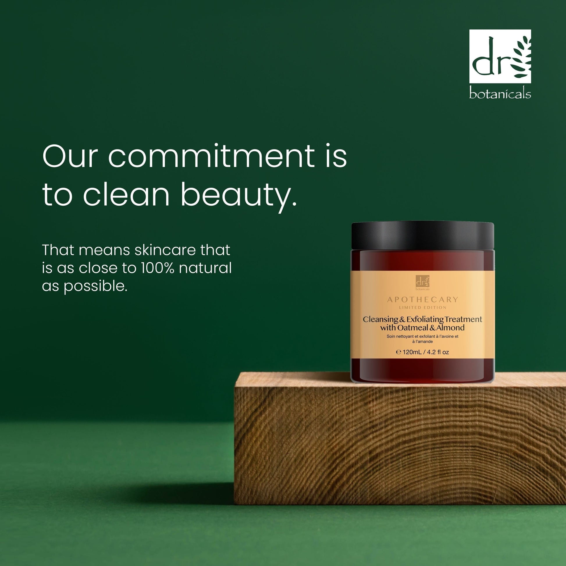 Skincare product on a wooden block with a green background and Dr Botanicals branding.