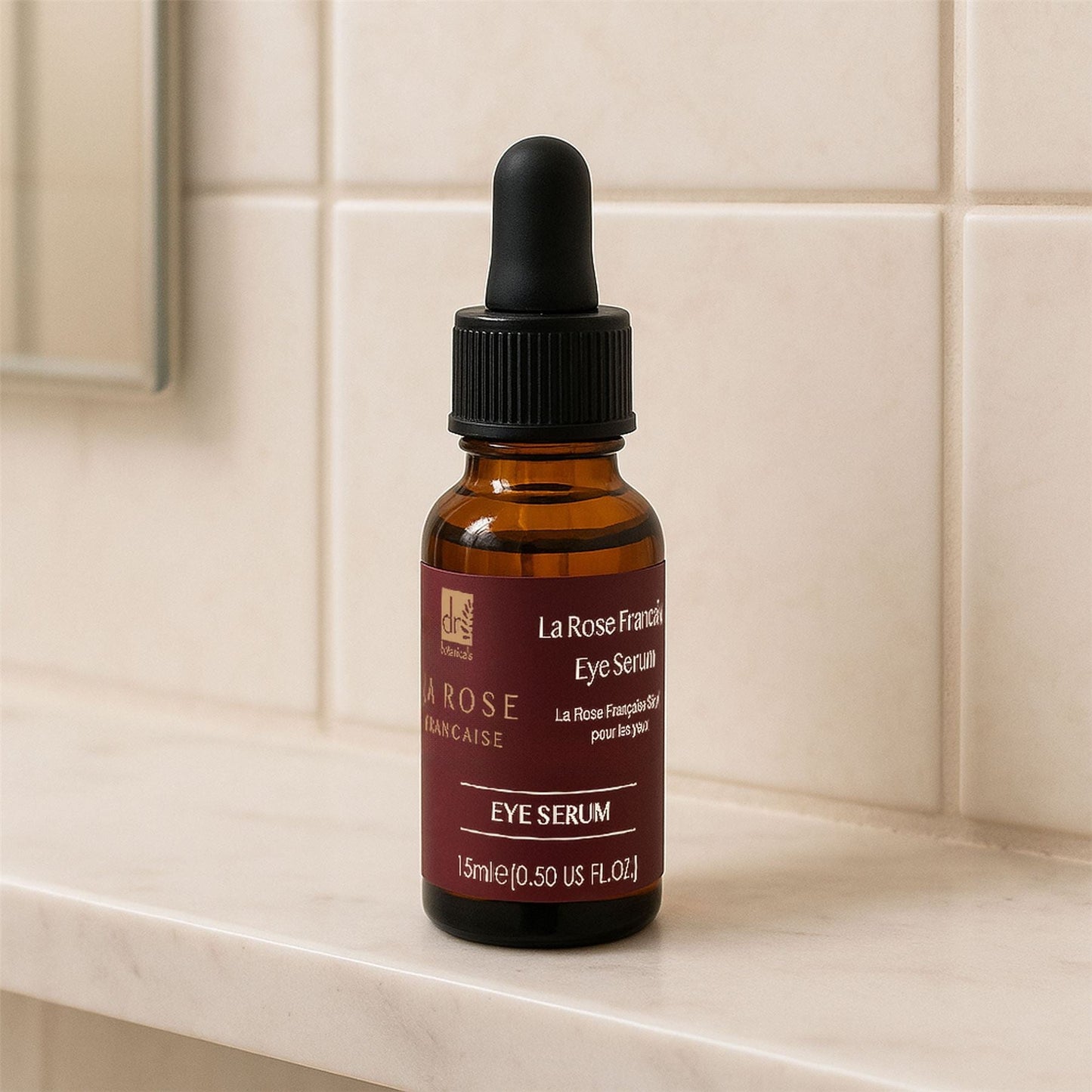 Bottle of La Rose Française Eye Serum on a bathroom counter