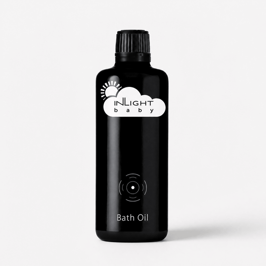 Black bottle of Inlight Beauty Baby Bath Oil 100ml on a white background