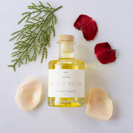 Salt + Steam Heavy Petal bath and body oil bottle