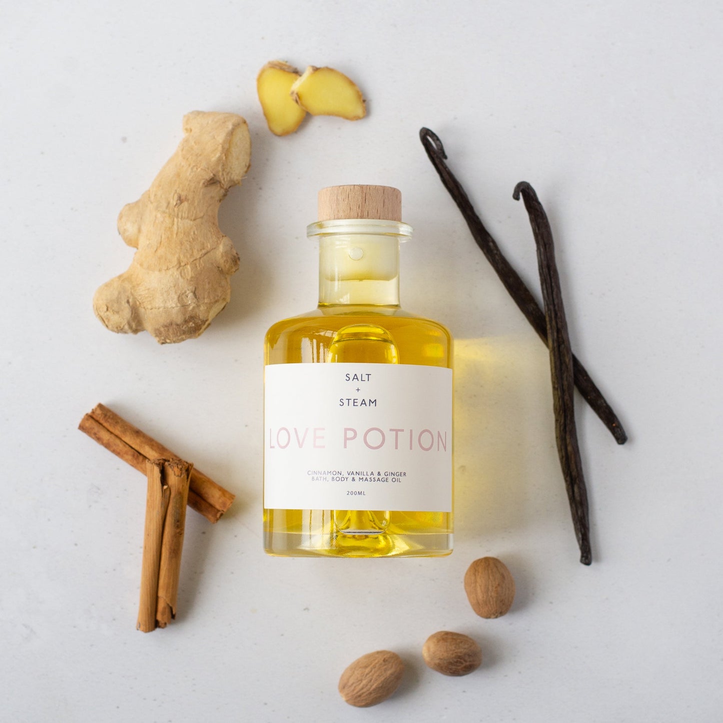 Salt + Steam Love Potion bath and body oil bottle