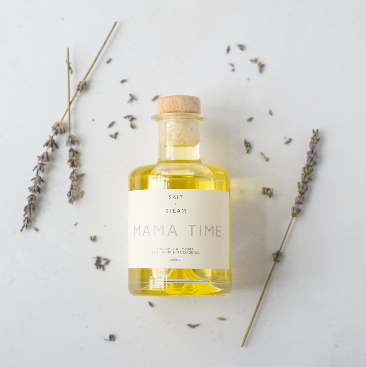 Salt + Steam Mama Time lavender bath and bump oil bottle