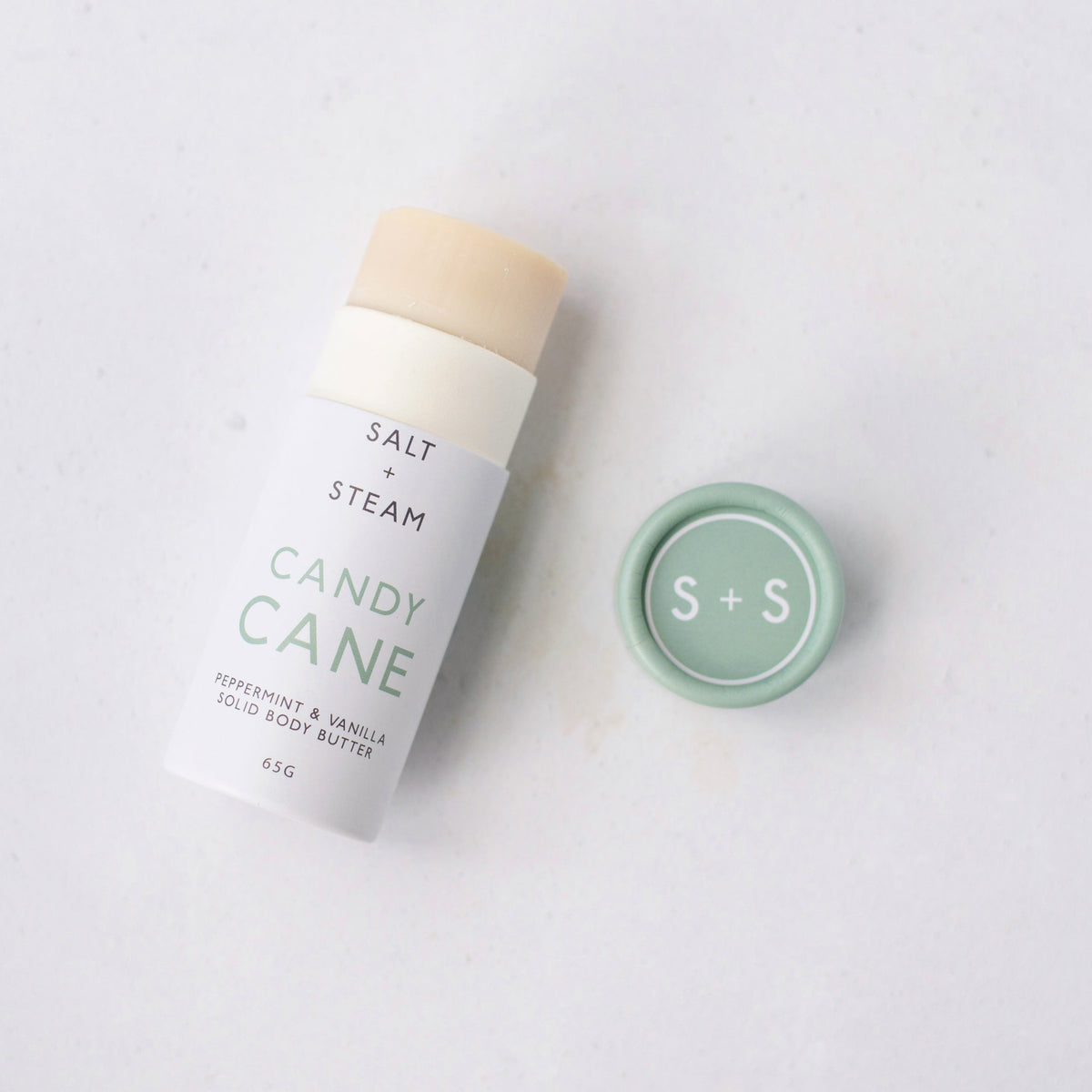 Salt + Steam Candy Cane body butter being applied to skin