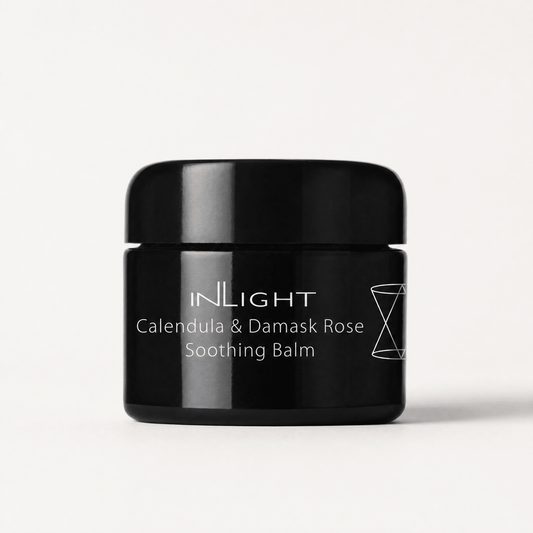 Black jar of Inlight Beauty Calendula & Damask Rose Soothing Balm 45ml on a white background