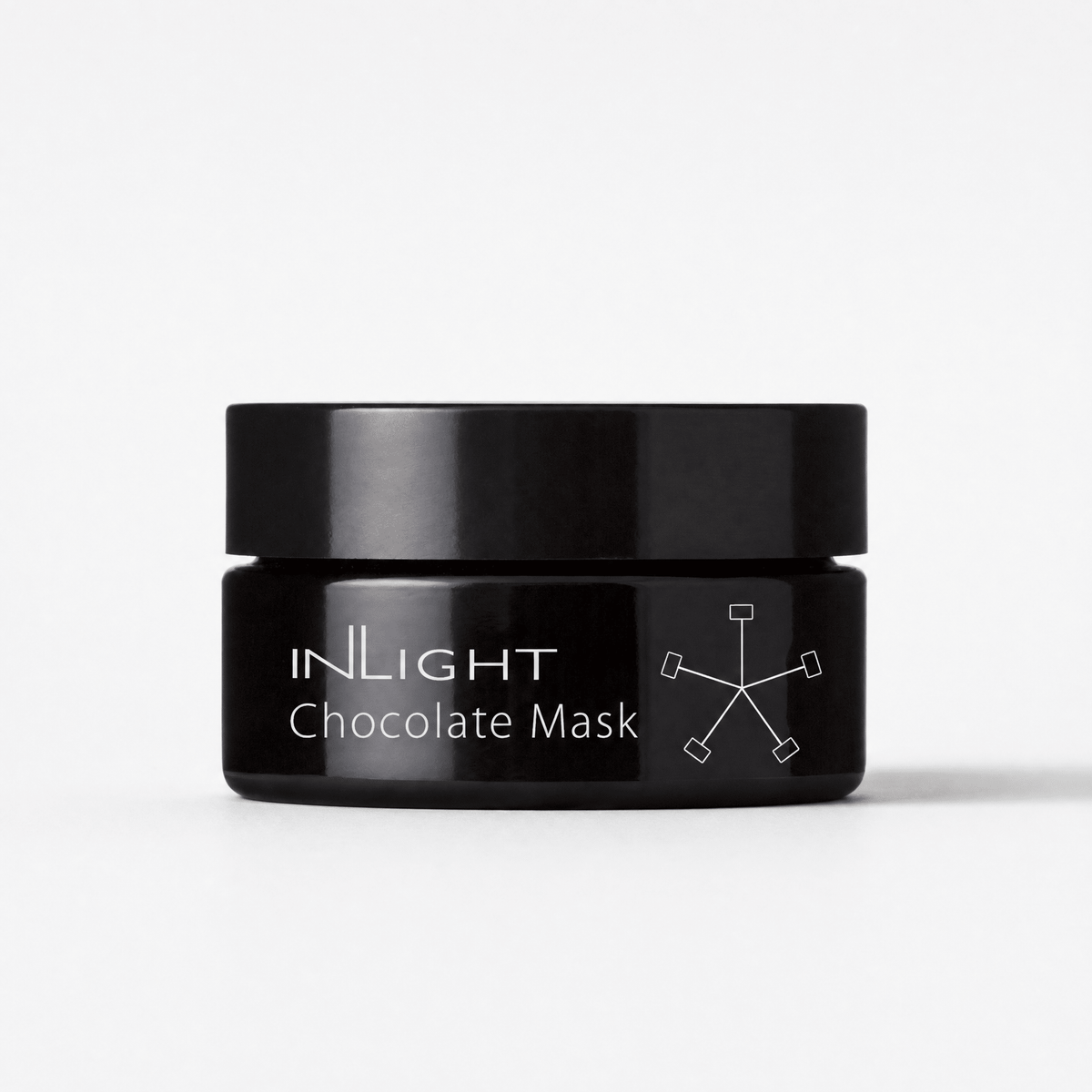 Black jar of Inlight Beauty Chocolate Mask 25ml on a white background