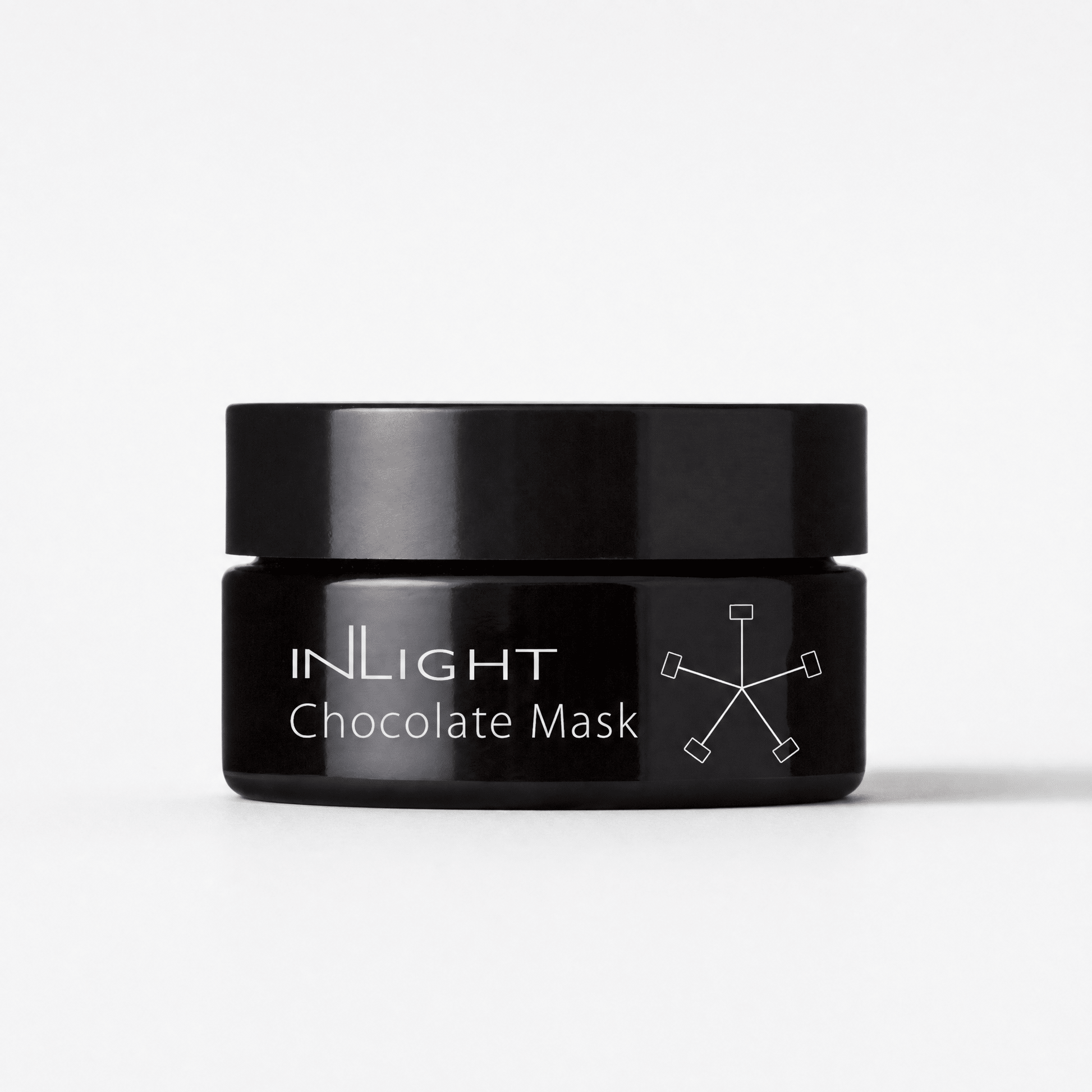Black jar of Inlight Beauty Chocolate Mask 25ml on a white background