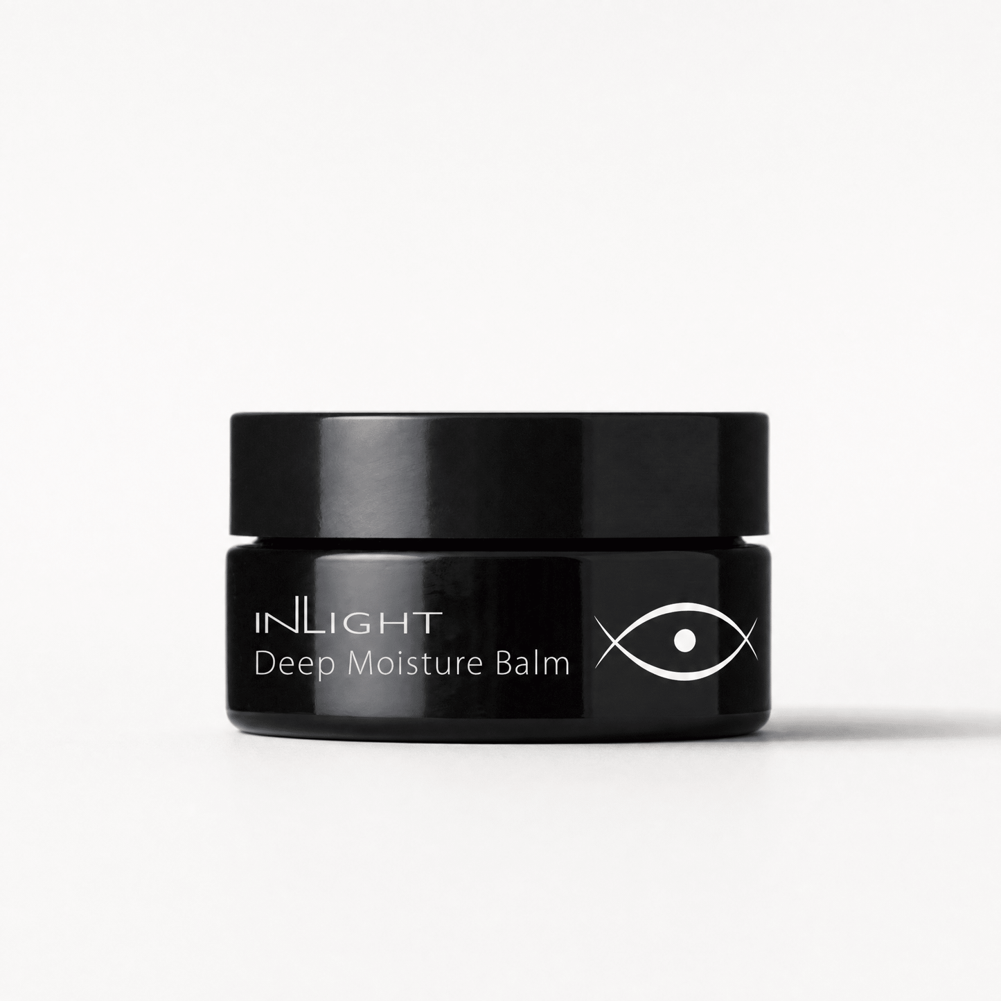 Black jar of Inlight Beauty Deep Moisture Balm 28ml on a white background