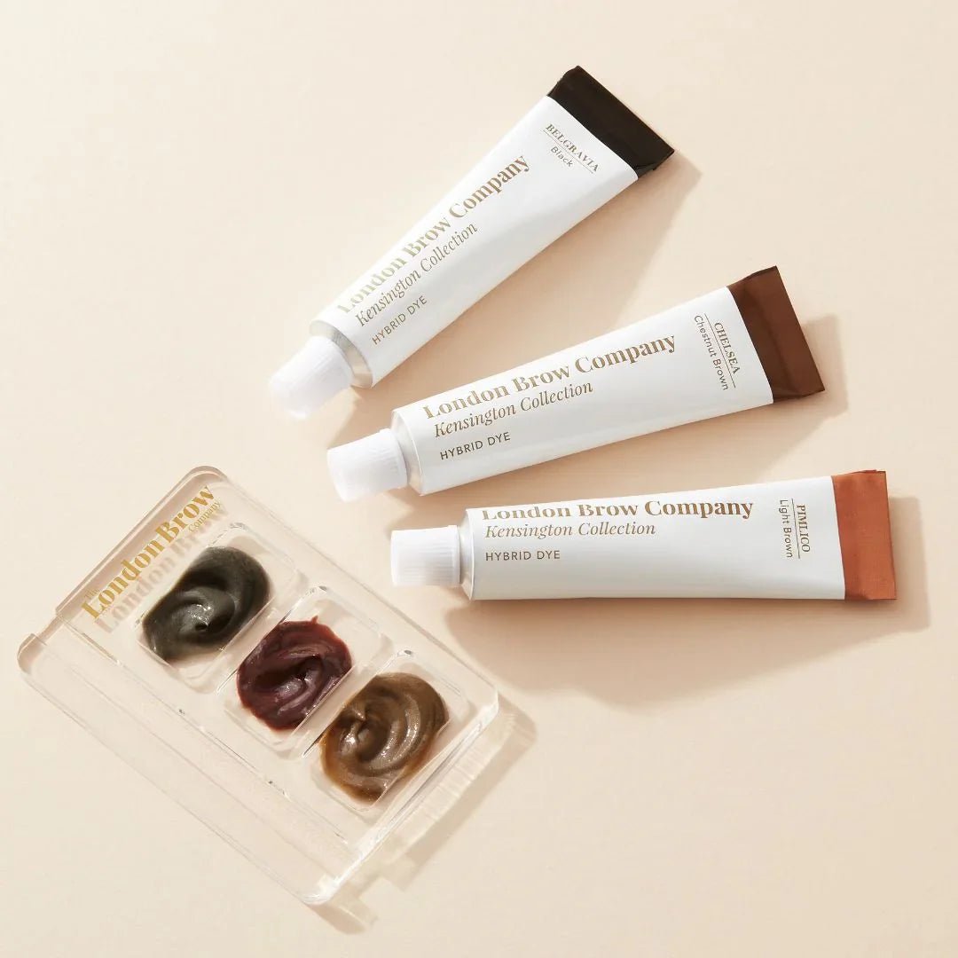 Three tubes of London Brow Company eyebrow products on a beige background