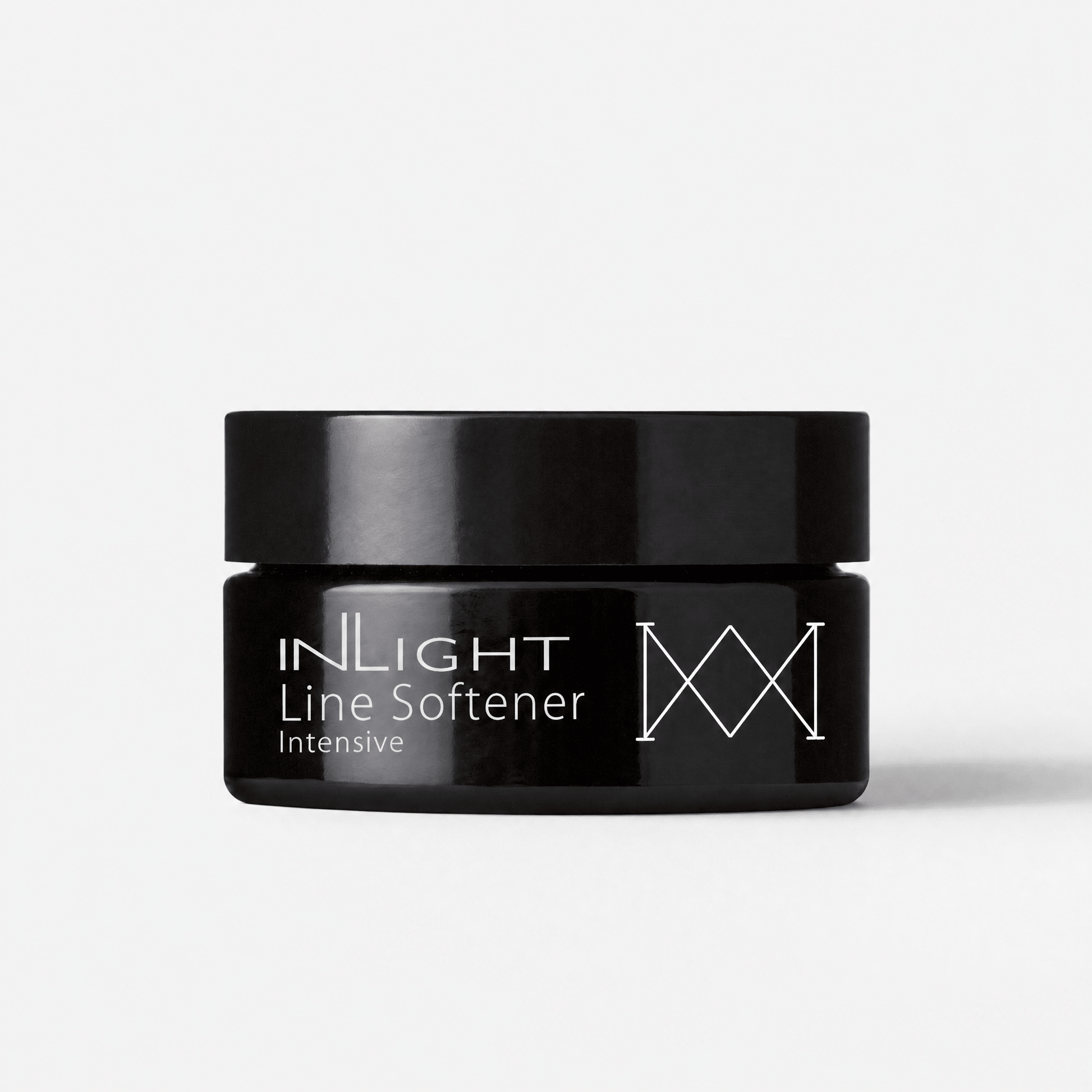 Black jar of Inlight Beauty Line Softener Intensive 15ml on a white background