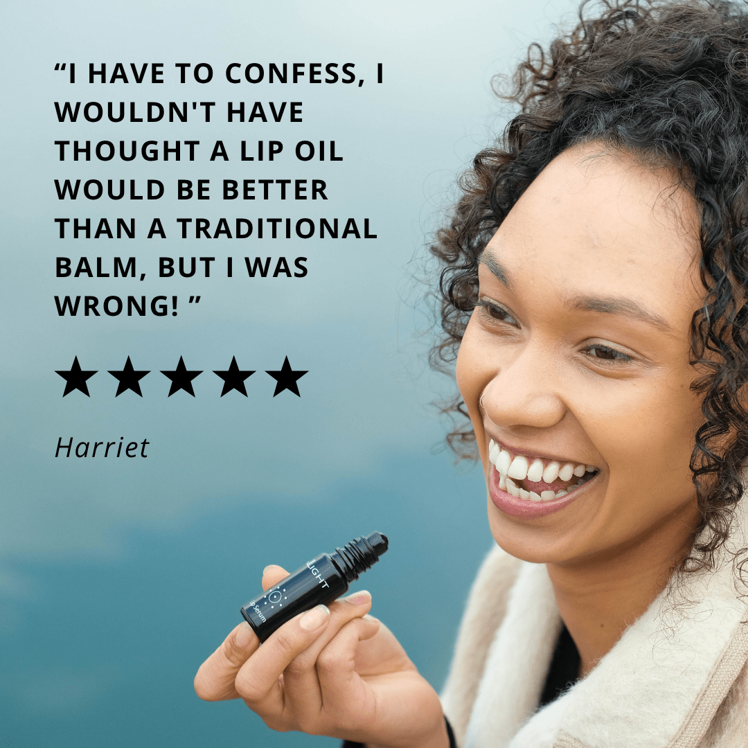 Woman holding an Inlight Beauty Lip Serum 10ml with a five-star rating and review text on a blue background