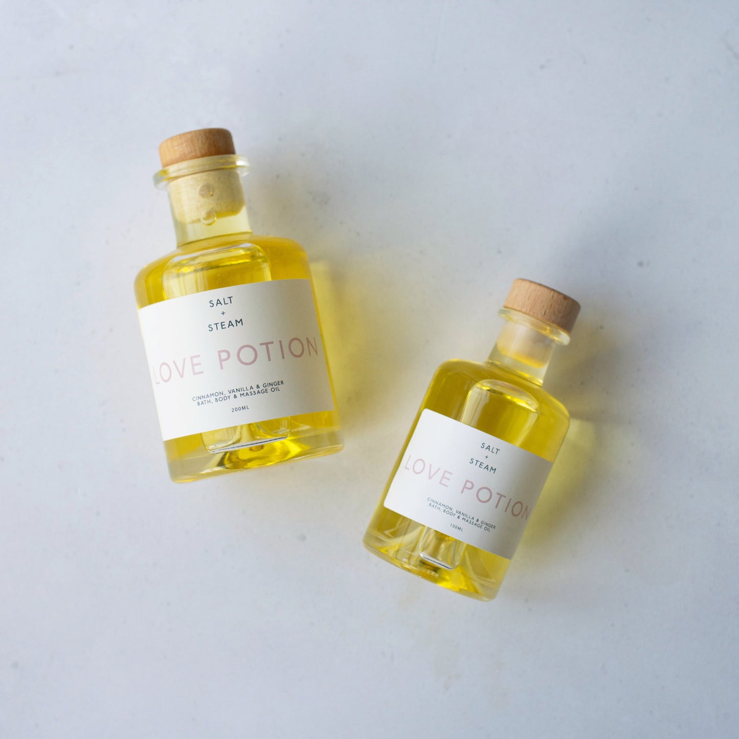 Salt + Steam Love Potion oil melting into bath water