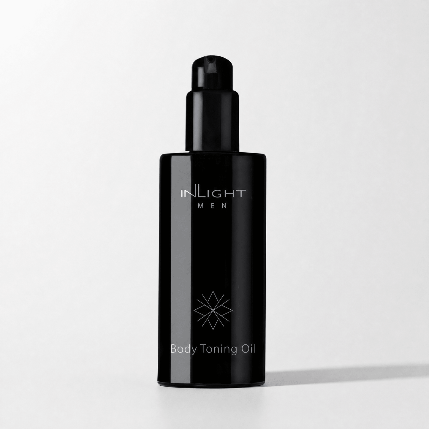 Black bottle of Inlight Beauty Body Toning Oil for Men 200ml on a white background