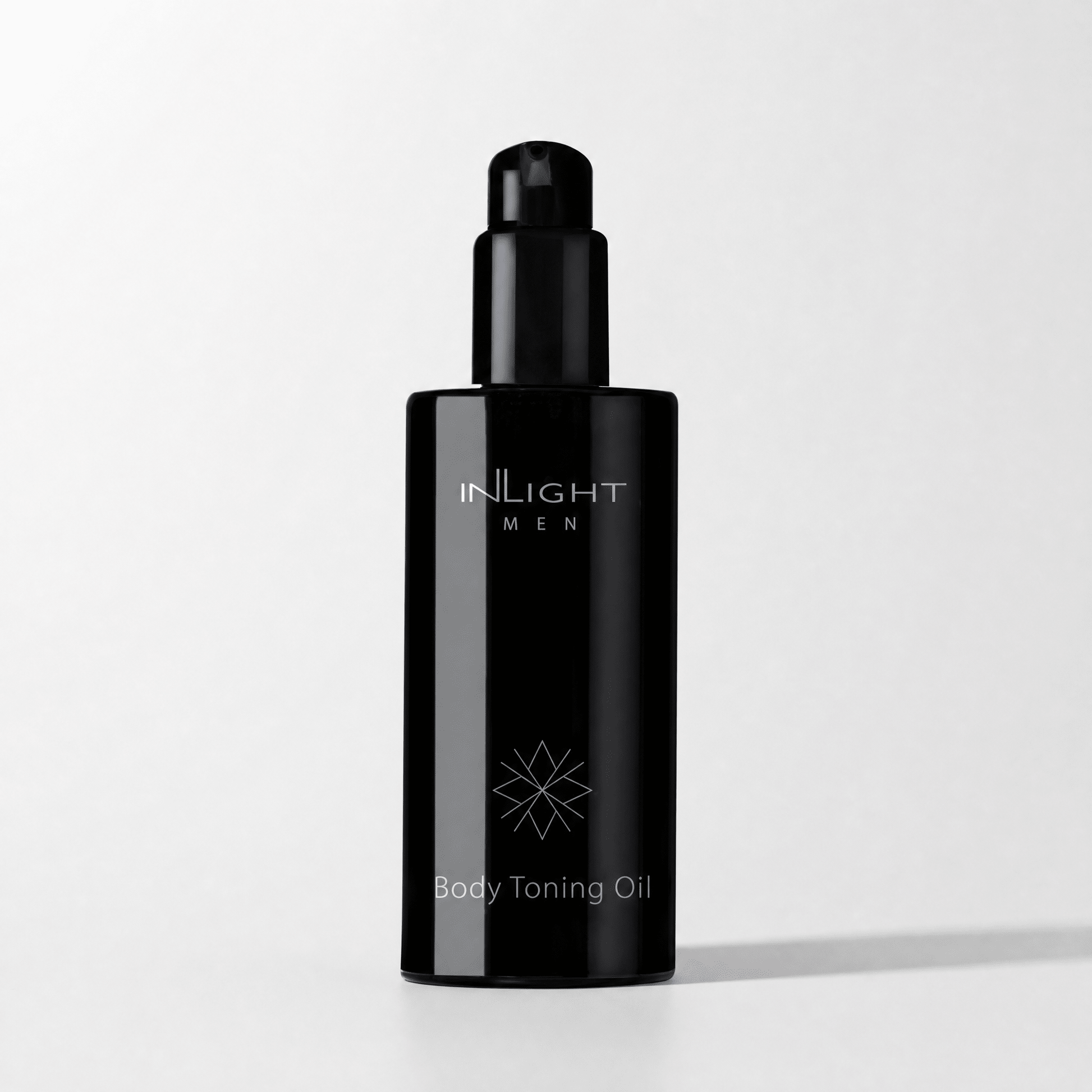 Black bottle of Inlight Beauty Body Toning Oil for Men 200ml on a white background
