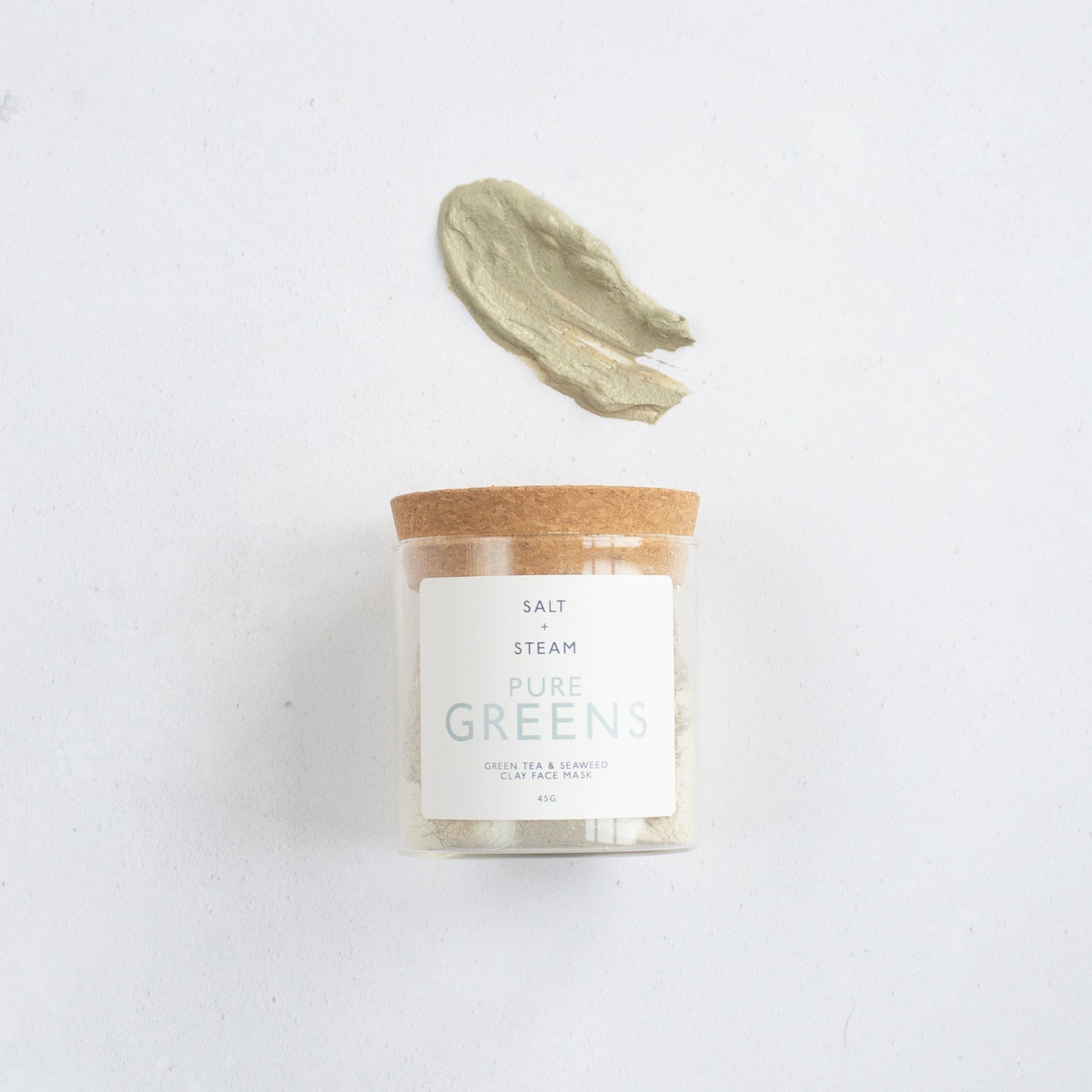 Salt + Steam Pure Greens clay mask powder mixed into a paste