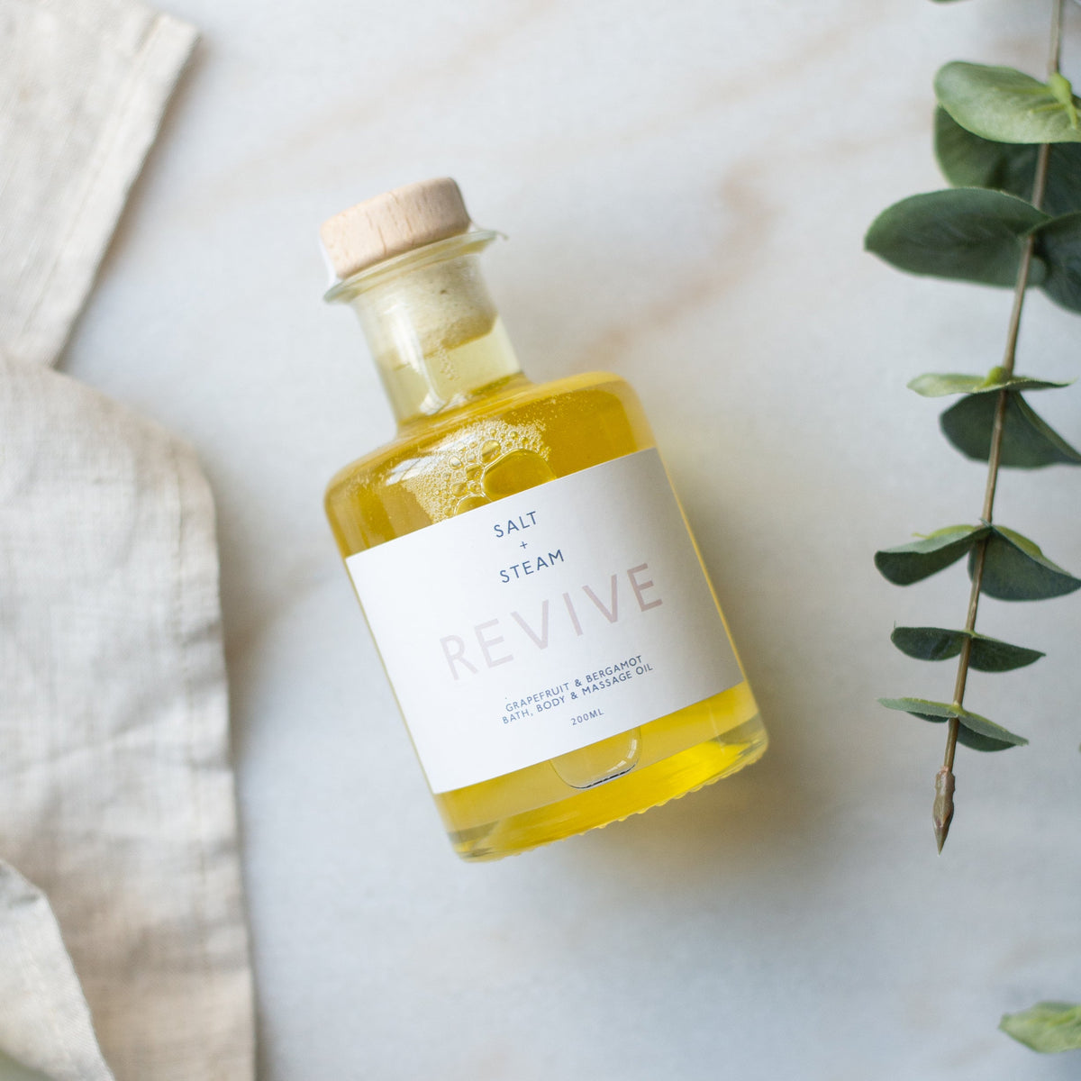 Salt + Steam bath and body oil range including Revive