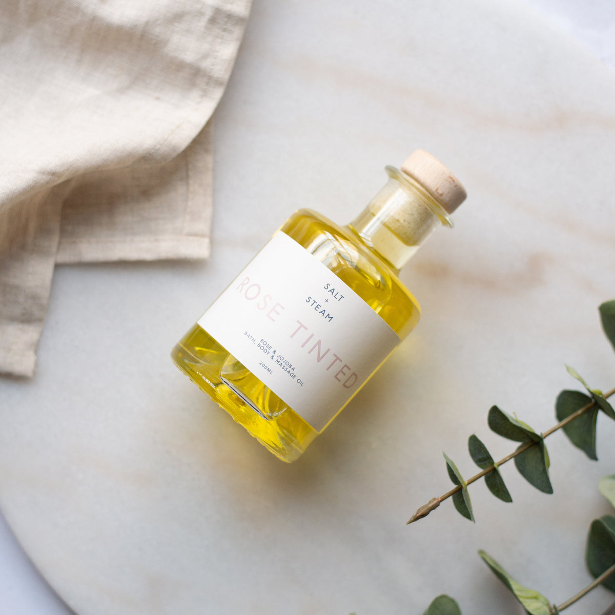 Salt + Steam bath and body oil range including Rose Tinted