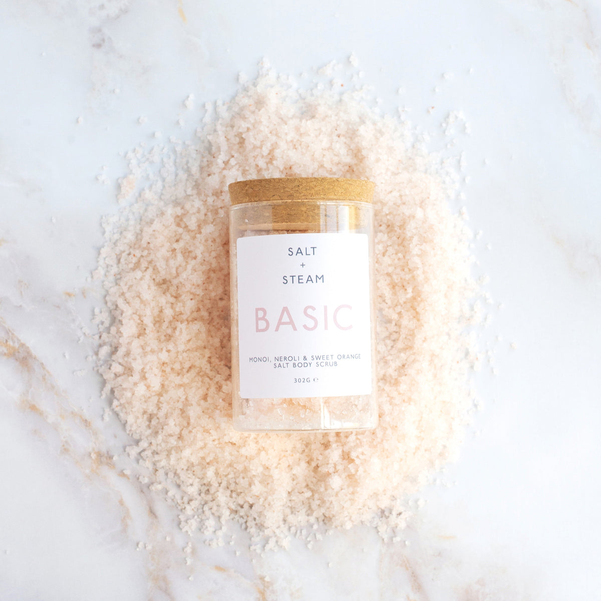 Salt + Steam Basic body scrub being applied to skin