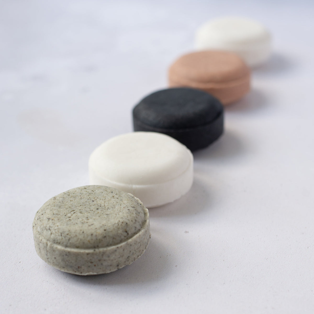 Salt + Steam shampoo bars displayed together