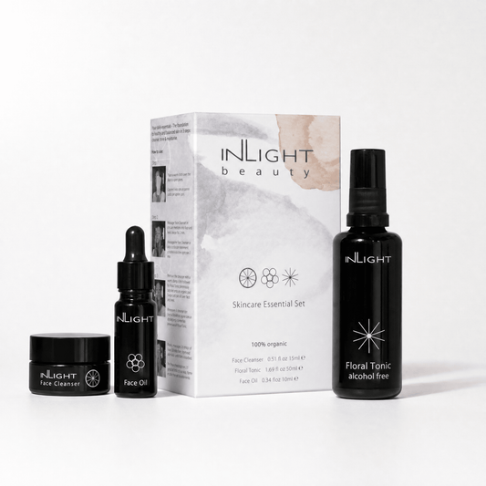 Inlight Beauty Skincare Essential Set products including Face Cleanser, Face Oil, and Floral Tonic on a white background.