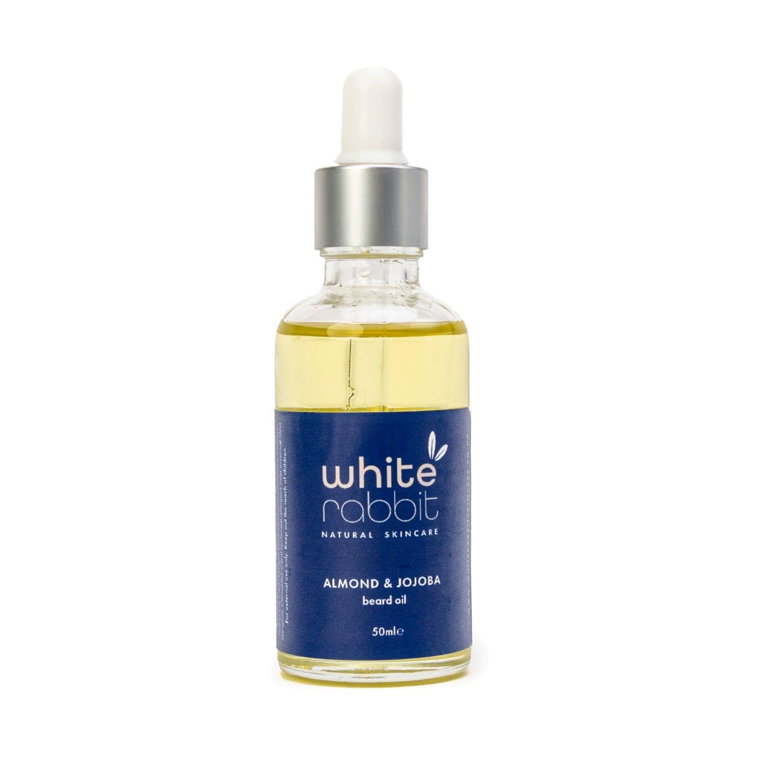Bottle of White Rabbit Almond & Jojoba beard oil on a white background