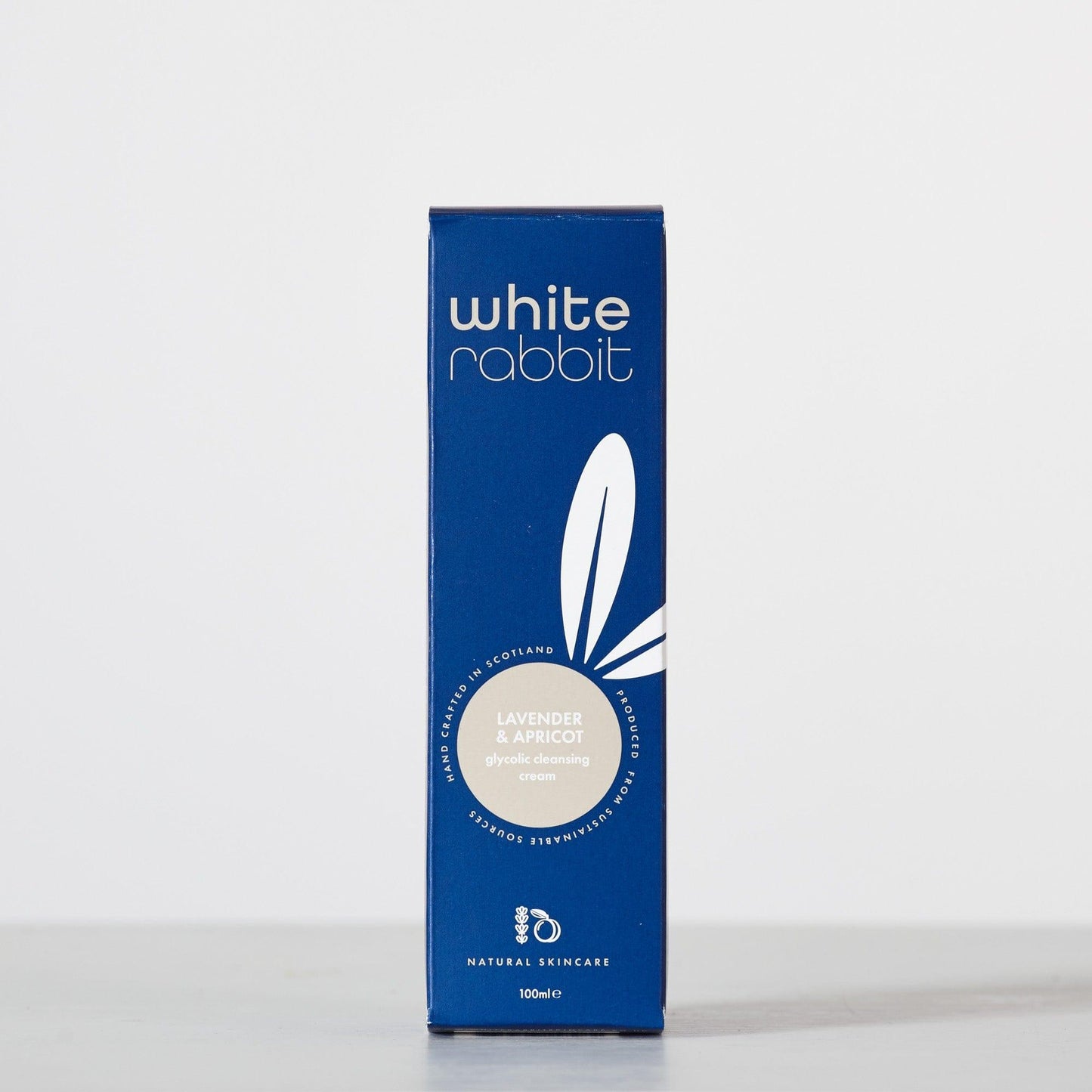 Blue box of White Rabbit skincare product on a white background