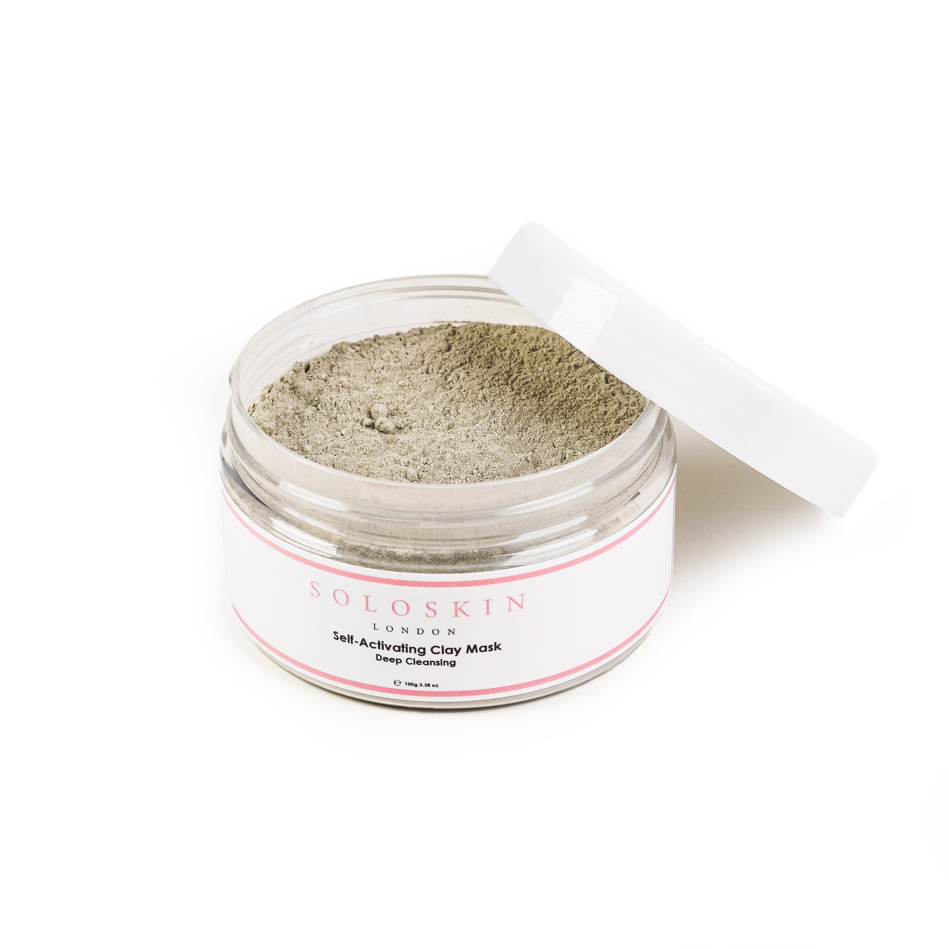 Clay mask in a jar with a white lid on a white background