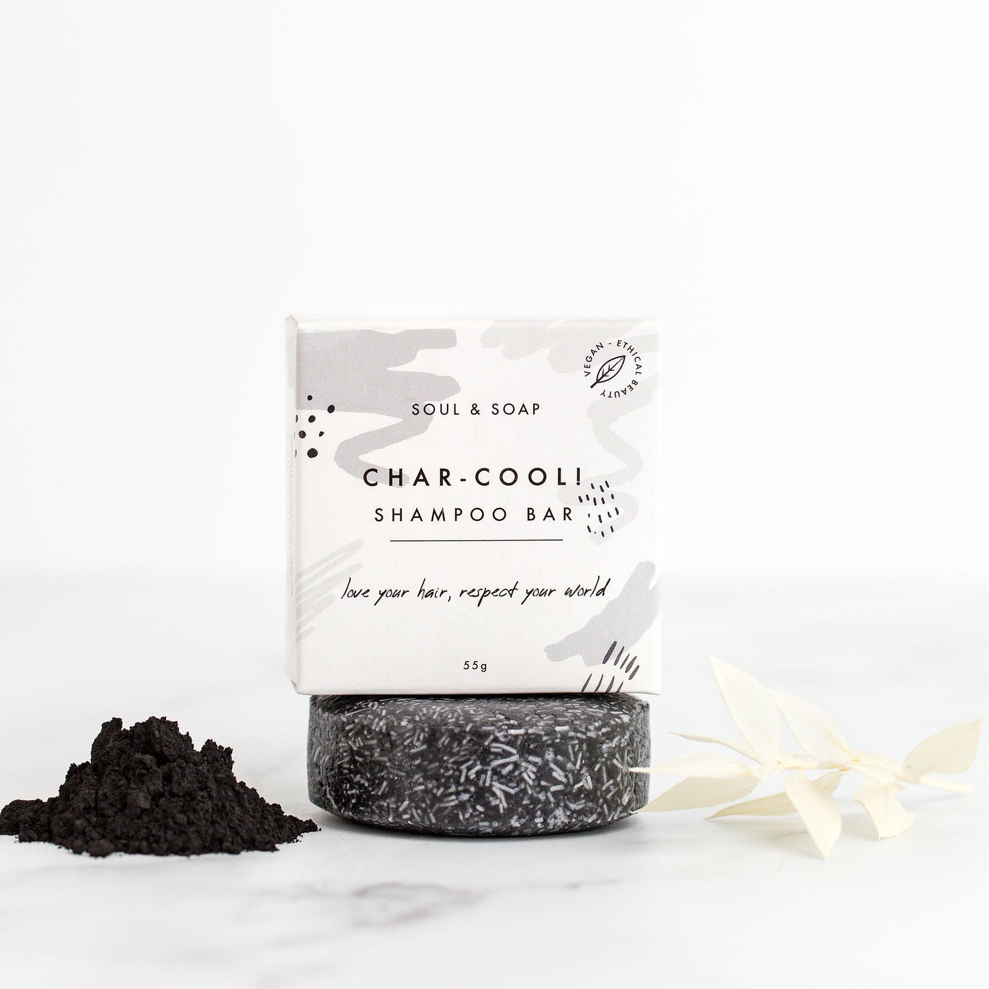 Shampoo bar with packaging labeled 'Soul & Soap' on a white background