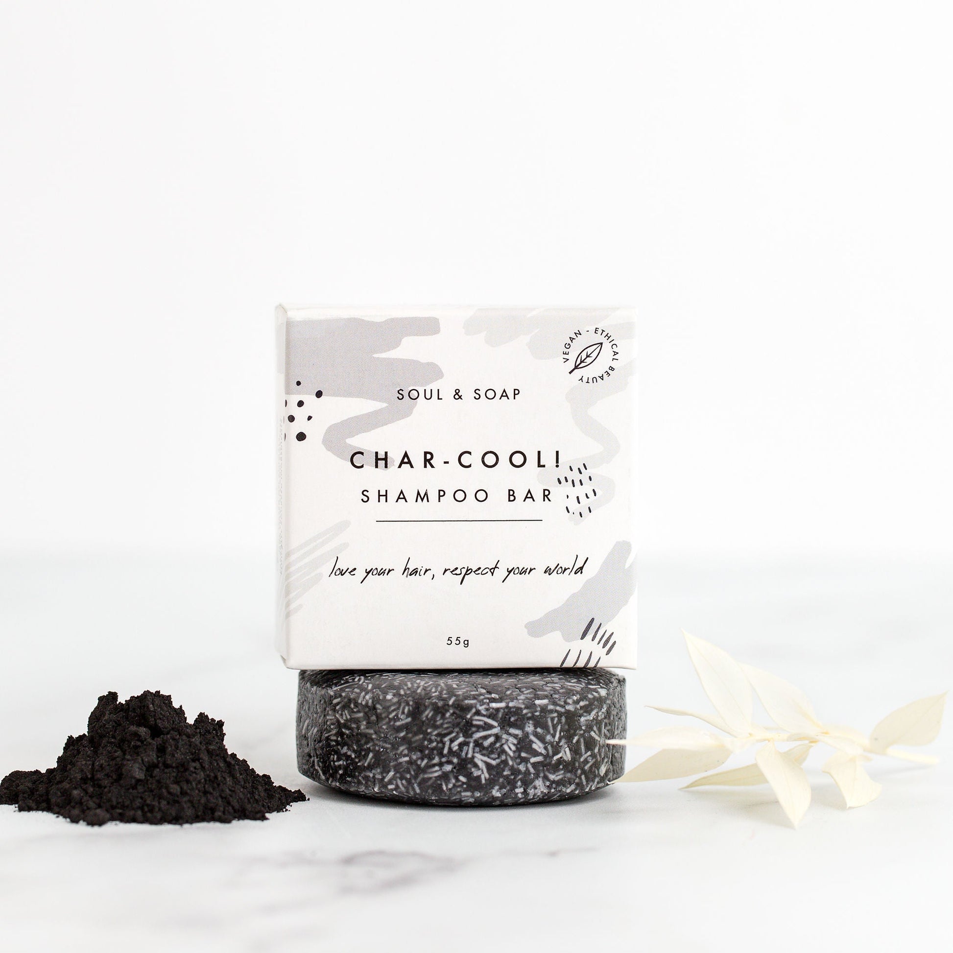 Shampoo bar with packaging labeled 'Soul & Soap' on a white background