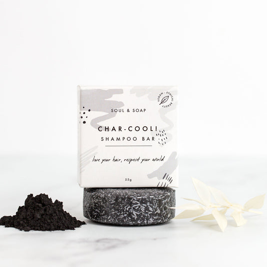 Shampoo bar with packaging labeled 'Soul & Soap' on a white background