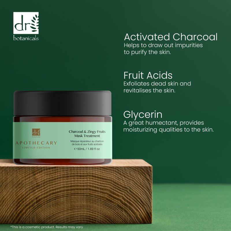 Jar of skincare product with text about activated charcoal, fruit acids, and glycerin on a green background.
