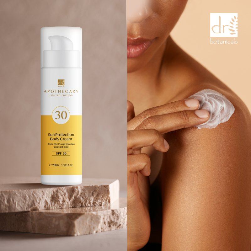 Sun protection body cream with SPF 30 on a neutral background, featuring the brand 'dr botanica'.
