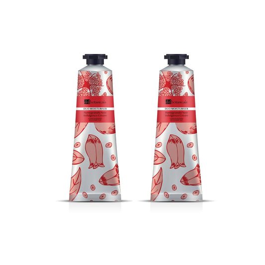 Two tubes of Dr Botanicals Pomegranate Noir Indulgence Cream with a red and white design on a white background