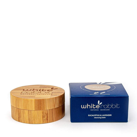 Wooden container and blue box with 'White Rabbit' branding on a white background