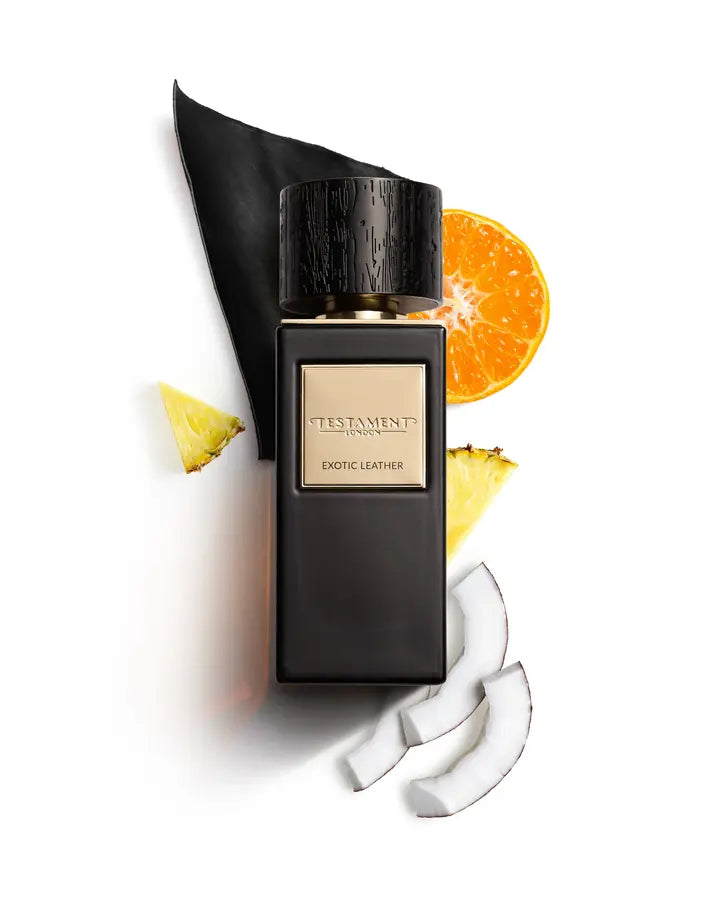 Perfume bottle labeled 'Exotic Leather' with fruit slices on a white background