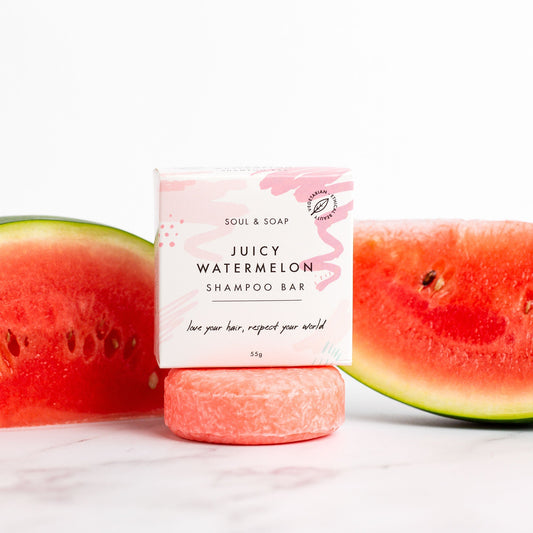 Shampoo bar with 'Juicy Watermelon' flavour packaging, surrounded by watermelon slices on a white background.