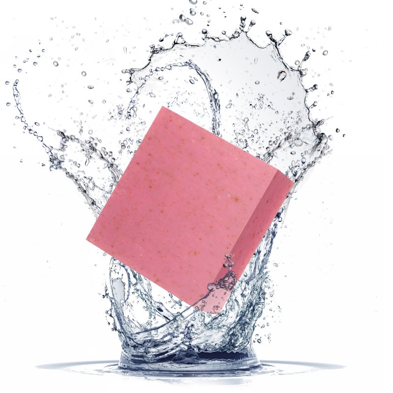 skinChemists La Rose Française Facial Cleansing Bar with water splashes on a white background