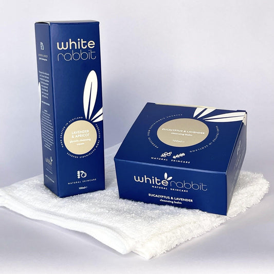 Two 'White Rabbit' skincare boxes on a white background