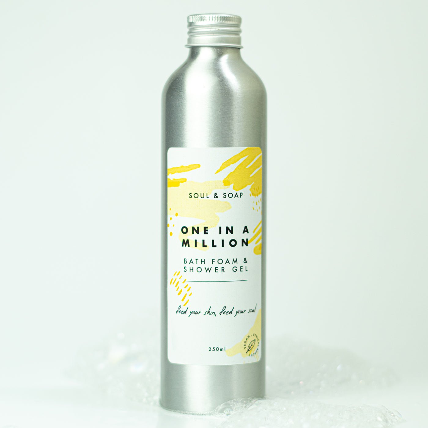 Bottle of 'One in a Million' bath foam and shower gel with a yellow label on a white background.