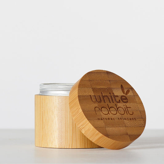 Bamboo container with wooden lid featuring 'White Rabbit' branding on a white background