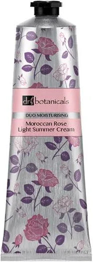 A squeeze tube of dr. botanicals Moroccan Rose Light Summer Cream, featuring a silver metallic background with a pink rose and purple leaf floral pattern, and a pink label band.