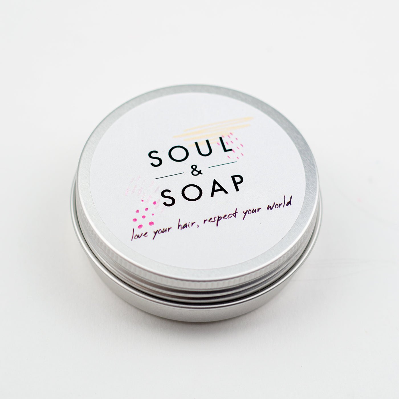 Silver tin with 'Soul & Soap' label on a white background