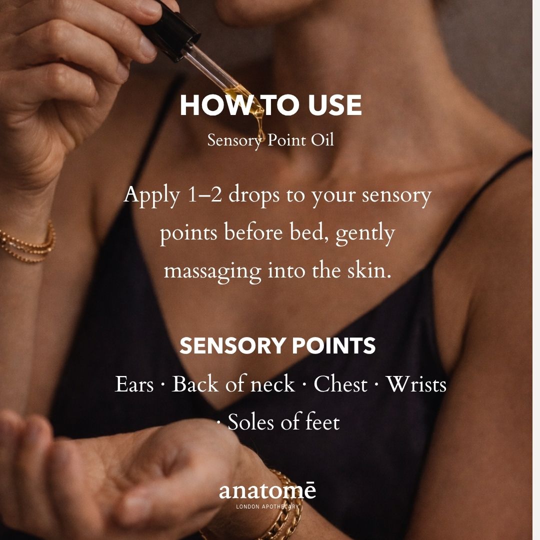 Person holding a dropper with Sensory Point Oil and instructions on how to use it.